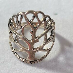 Sterling 925 tree ring.